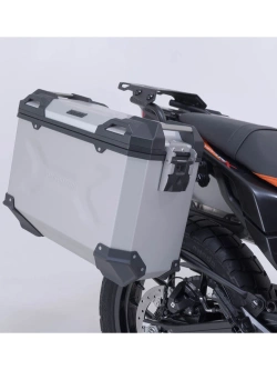 Zestaw: kufry boczne + kufer centralny TRAX ADV + stelaże SW-Motech KTM (wybrane modele) srebrne [poj.: 2 x 37l + 38l]