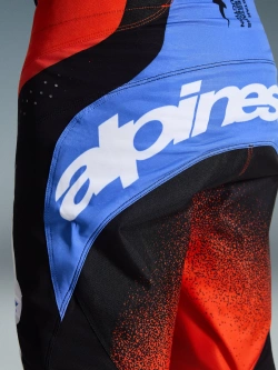 Spodnie cross Alpinestars MX Techstar Knif pomarańczowo-czarno-niebieskie