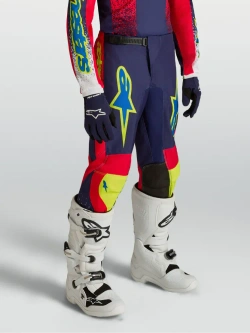 Spodnie cross dziecięce Alpinestars MX Fluid Drag niebiesko-czerwono-żółte