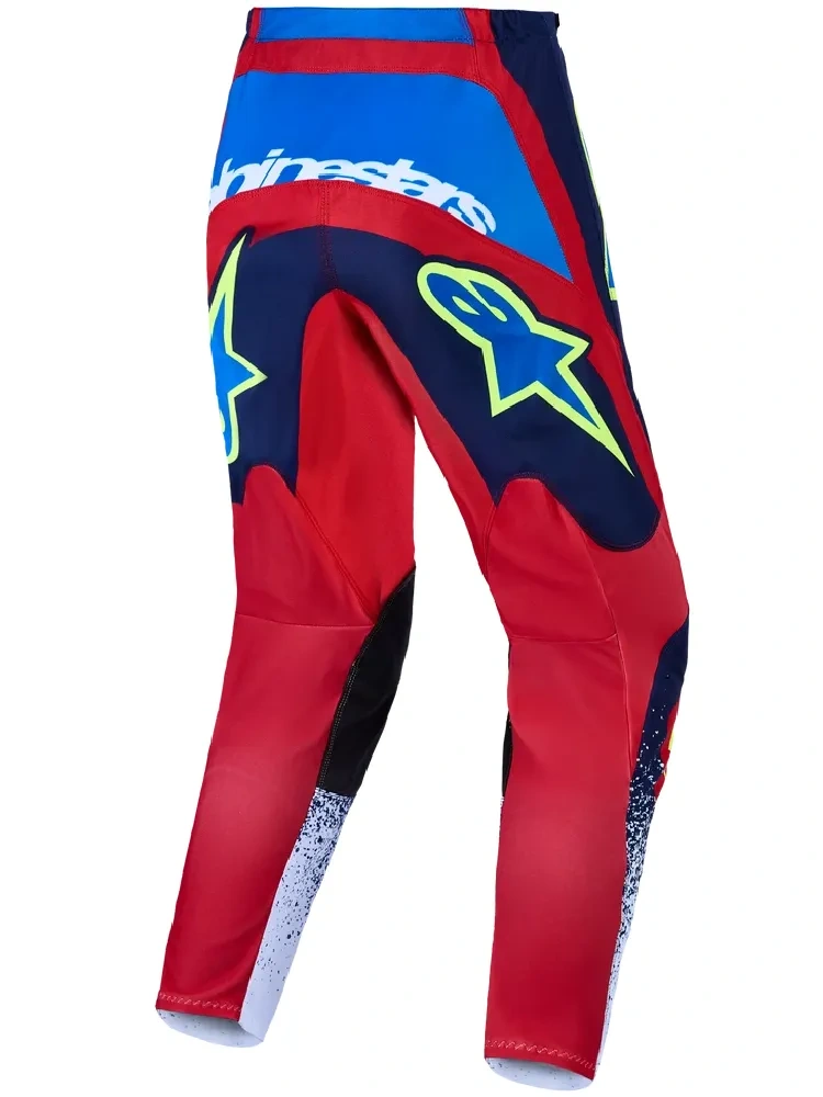 Spodnie cross Alpinestars MX Fluid Drag niebiesko-czerwono-żółte