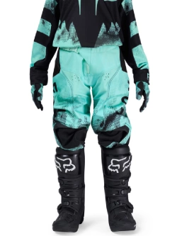 Spodnie cross dziecięce Fox 180 Kairos Torquoise czarno-niebieskie