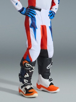 Spodnie cross dziecięce Alpinestars MX Fluid Grid pomarańczowo-biało-niebieskie