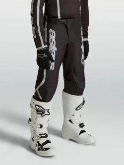 Spodnie cross dziecięce Alpinestars MX Fluid Apex V2 czarno-srebrne